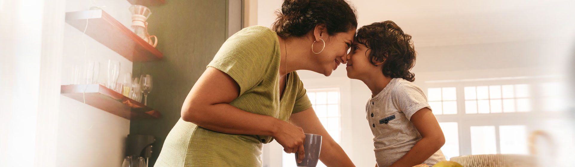 mom and child touching noses